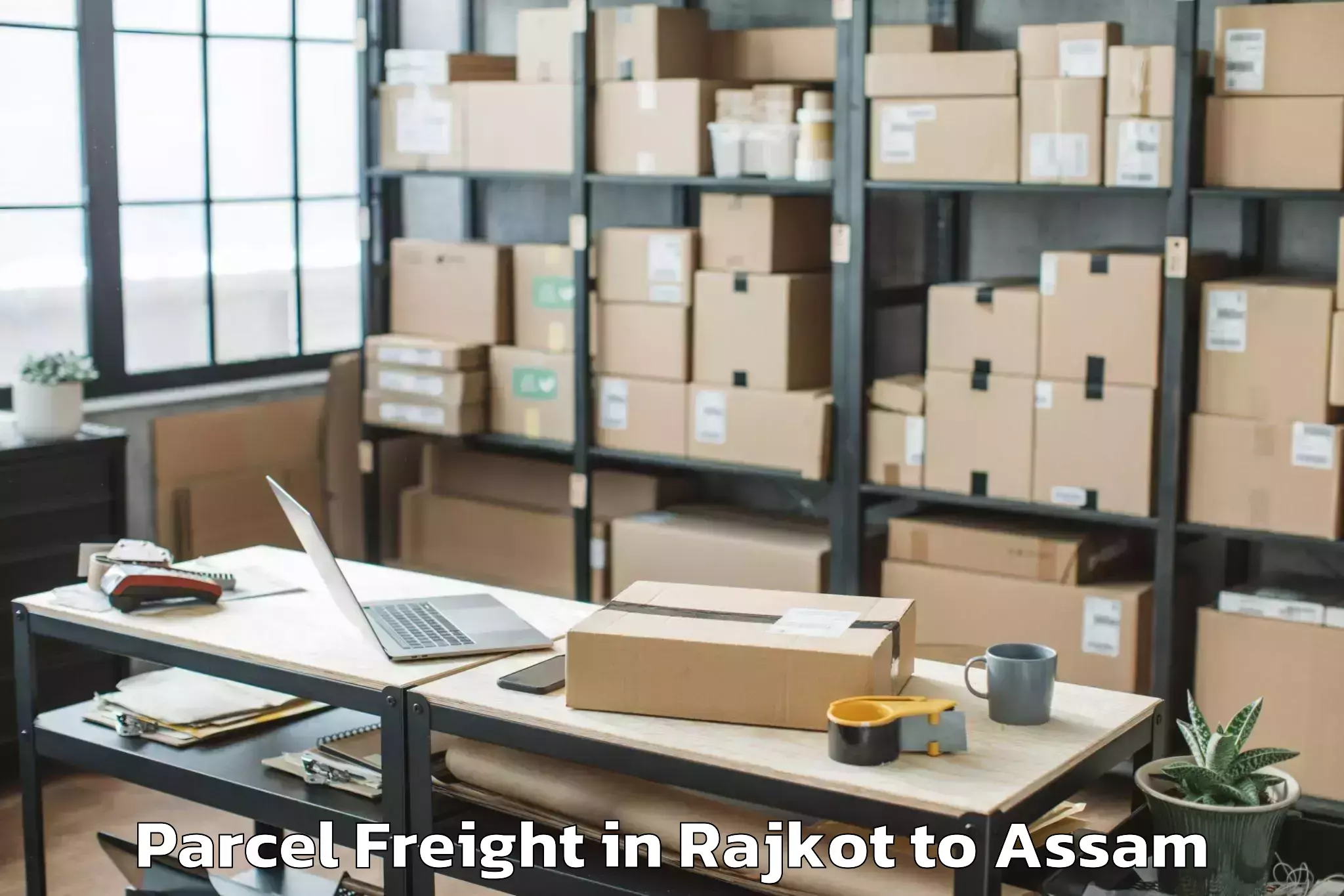 Discover Rajkot to Kumbhirgram Parcel Freight